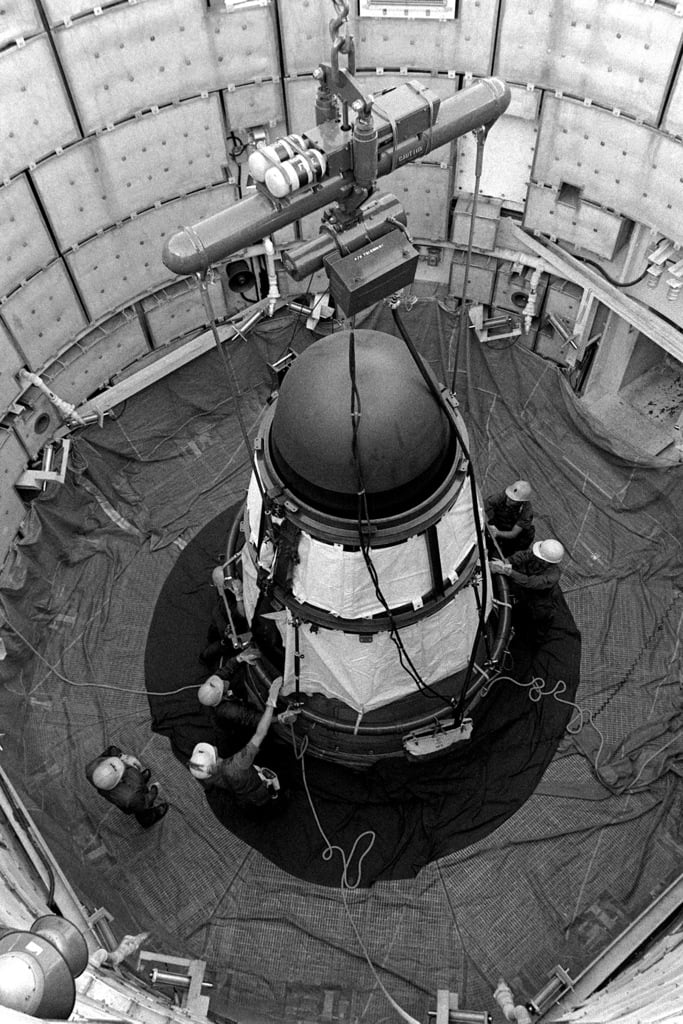 A titan II missile's warhead in it's silo in black and white